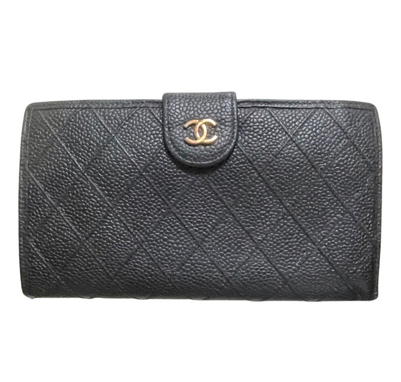 Chanel Vintage black caviar leather wallet with stitches and gold tone CC motif