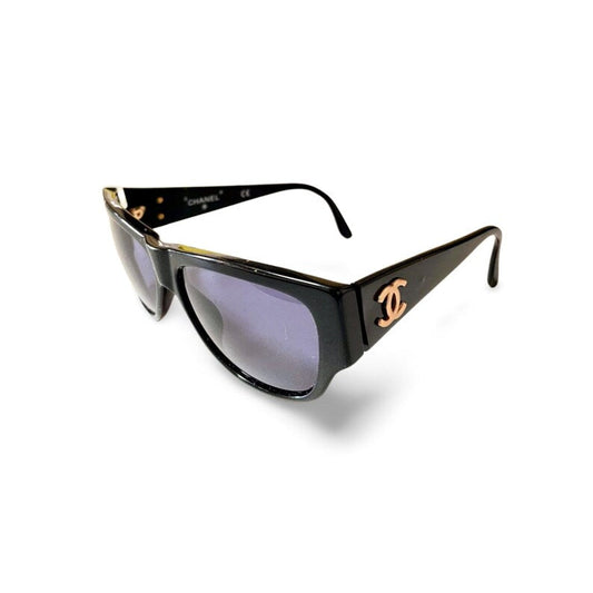 Chanel Vintage black frame sunglasses with golden CC motifs at sides
