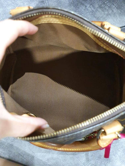 Louis-Vuitton Vuitton Speedy 25 Monogram Canvas Handbag