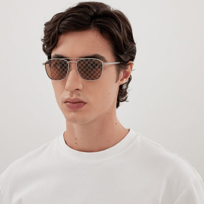 INSTITUTIONAL LOGO Caravan shape. Gucci Guccissima len