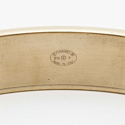 Chanel CC Composite Gold Tone Bangle Bracelet
