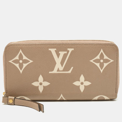 LOUIS VUITTON Tourterelle/Creme Monogram Empreinte Leather Zippy Wallet