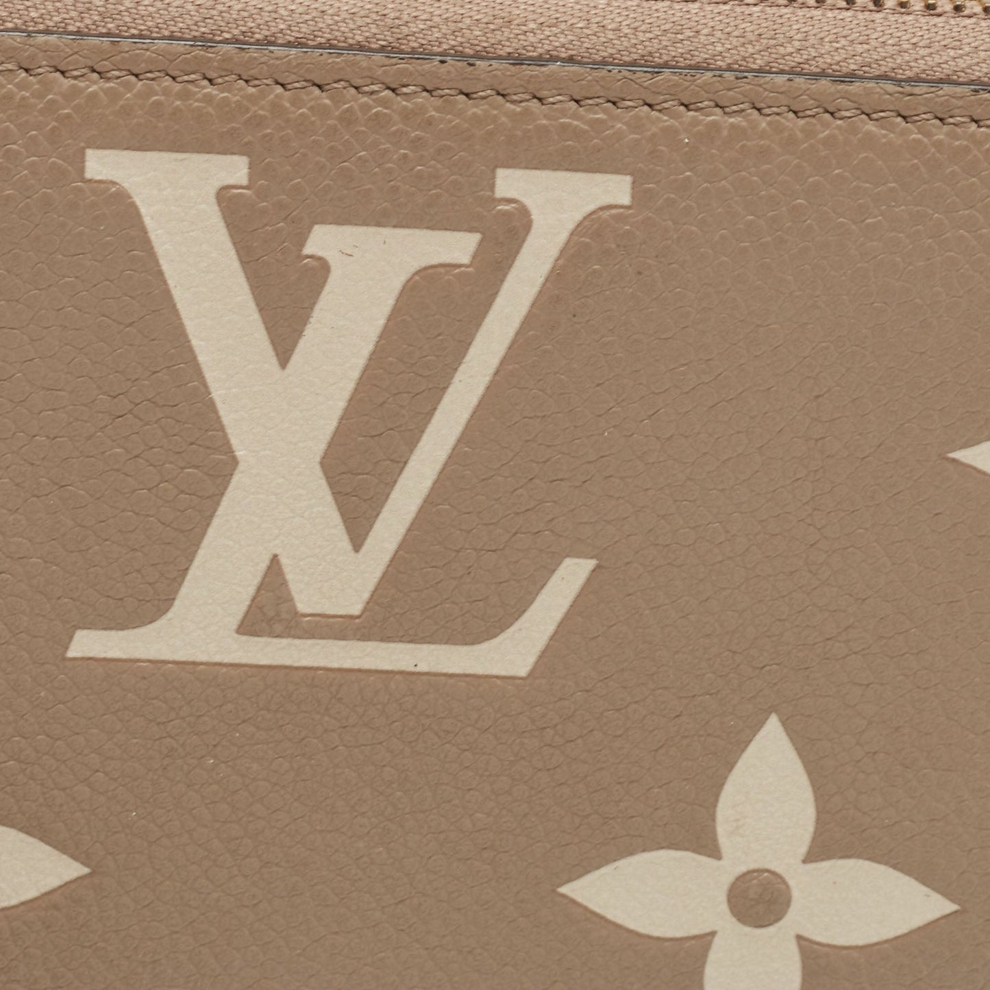 LOUIS VUITTON Tourterelle/Creme Monogram Empreinte Leather Zippy Wallet