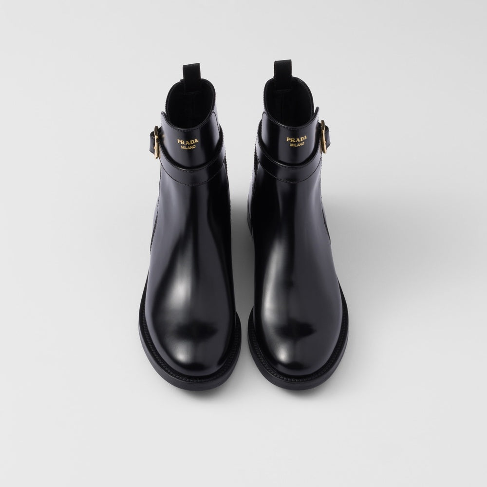 Brushed leather ankle boots with strap