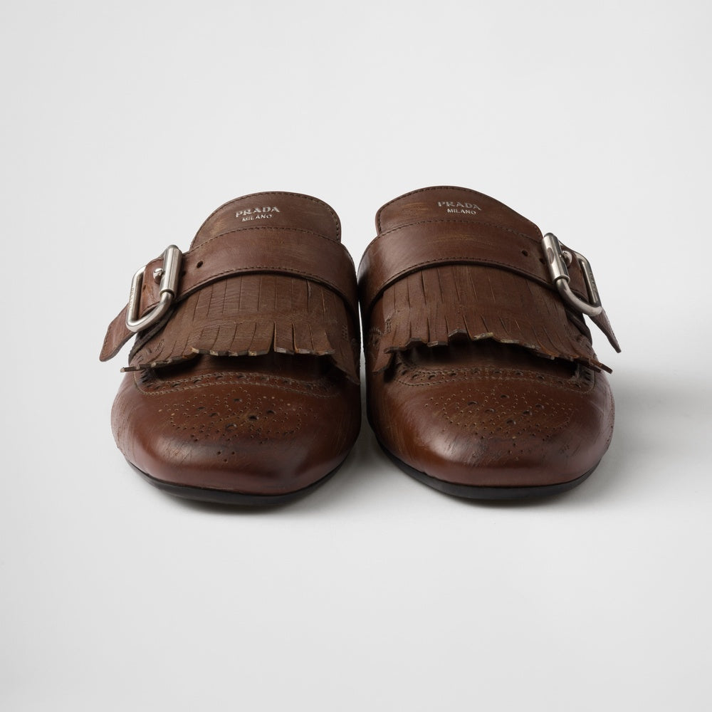 Shuffle fringed leather mules