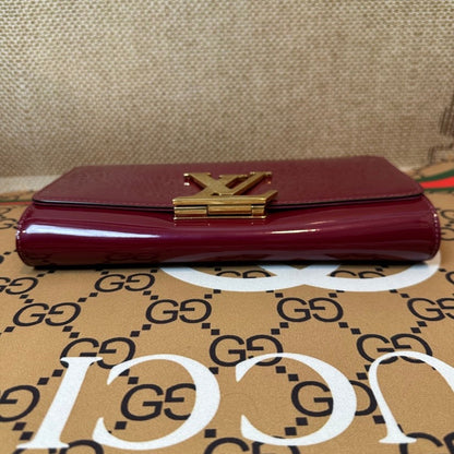 LV patent leather bag