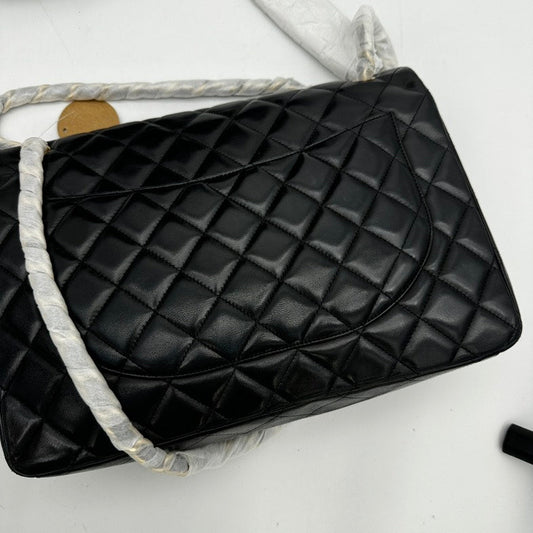 Chanel Maxi Flap Bag Black Lambskin Quilted Large