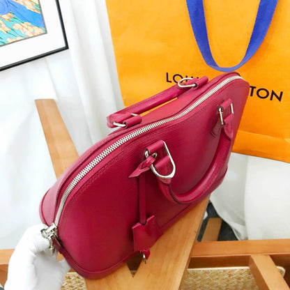Louis Vuitton Epi Alma PM Raspberry Leather Handbag