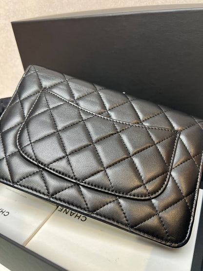 CHANEL Quilted Leather Black Clutch Bag