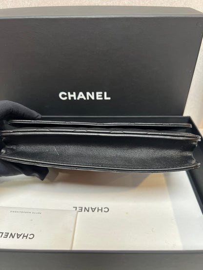 CHANEL Quilted Leather Black Clutch Bag