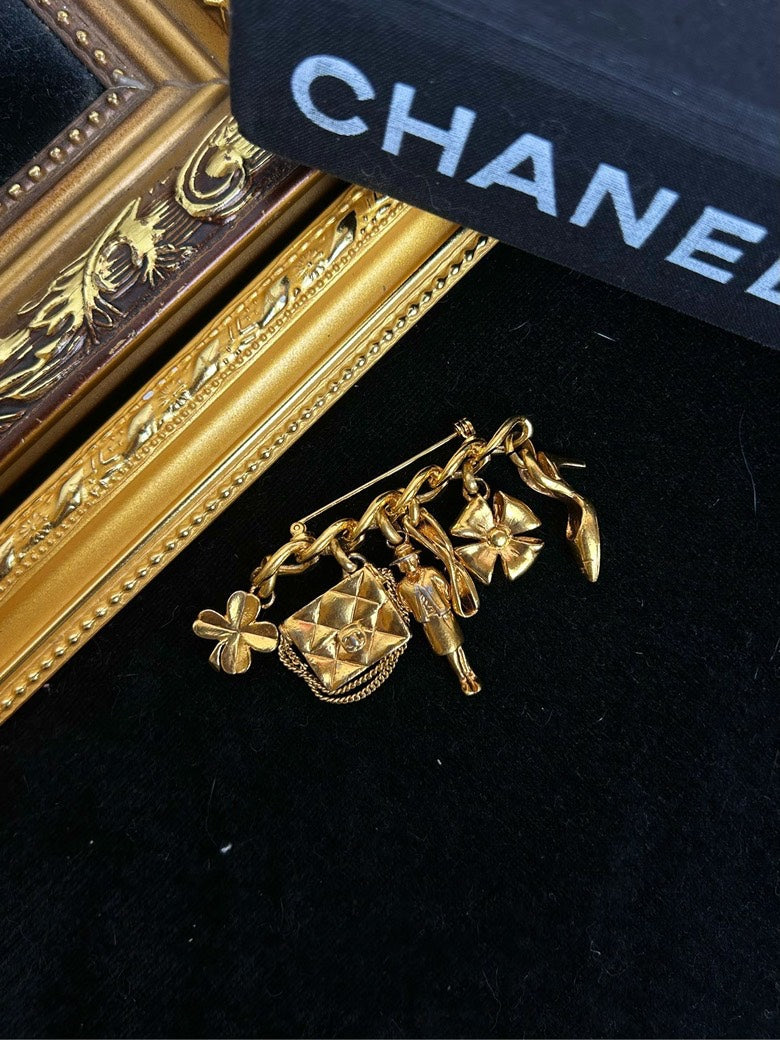 Chanel Four-Leaf Clover Perfume Bottle Multi-Element Brooch Gold