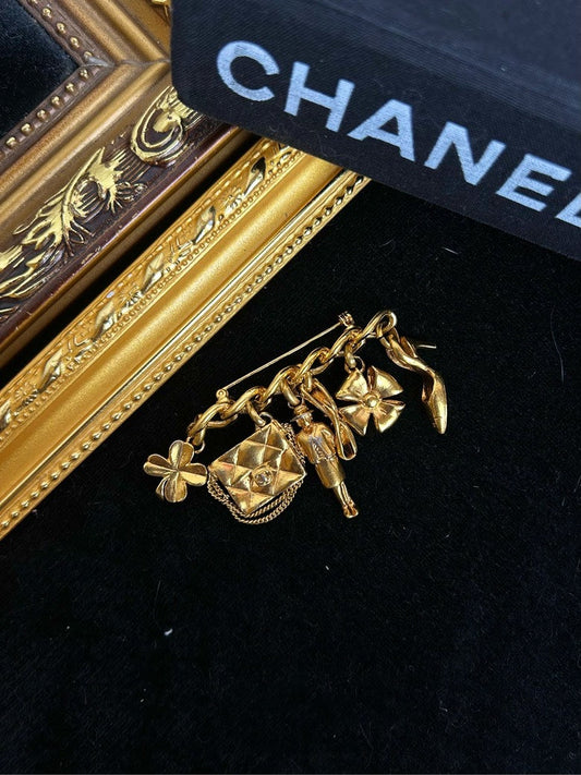 Chanel Four-Leaf Clover Perfume Bottle Multi-Element Brooch Gold