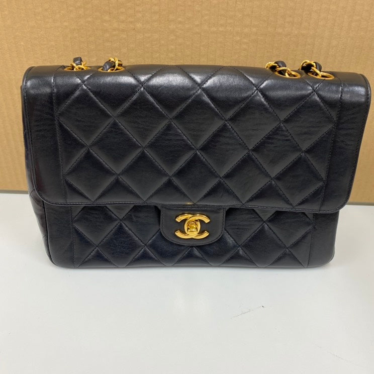vintage Chanel single flap bag E