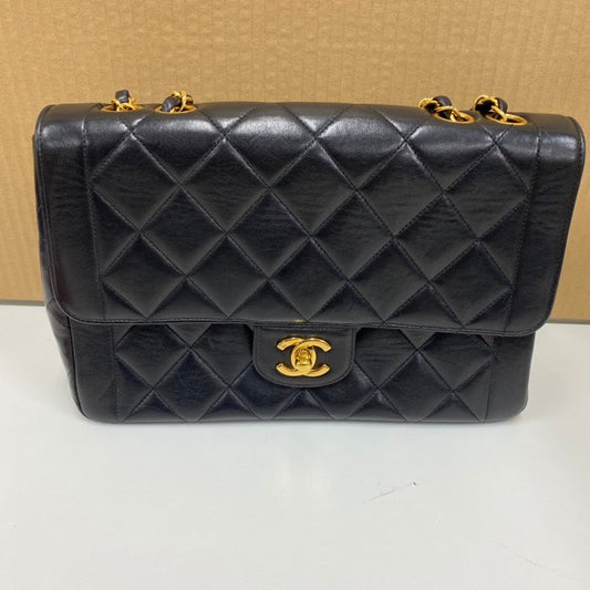 vintage Chanel single flap bag E