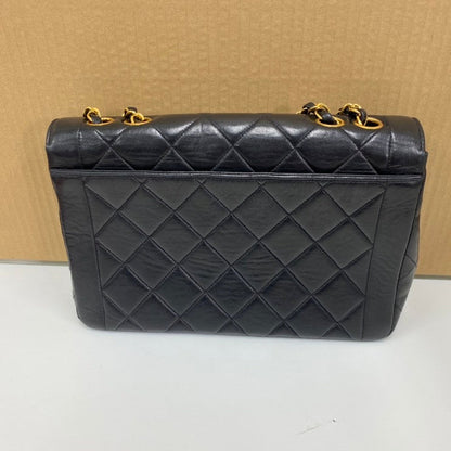 vintage Chanel single flap bag E