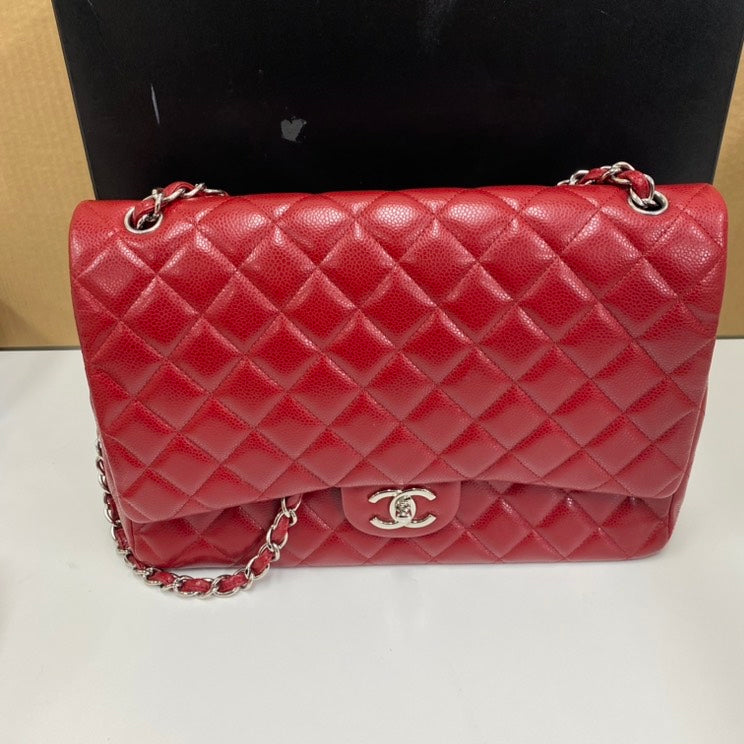 Vintage Chanel lamb skin maxi cf E