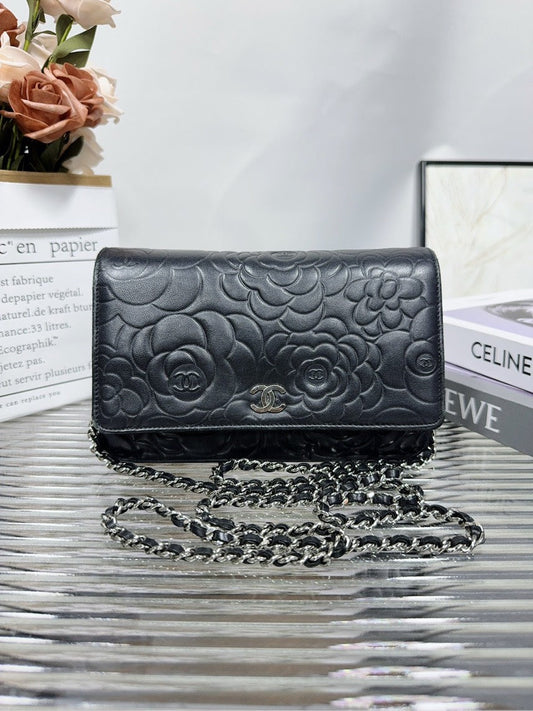 Preloved Chanel Camellia Embossed Black Leather Crossbody Bag