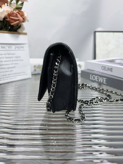 Chanel Camellia Embossed Black Leather Crossbody Bag