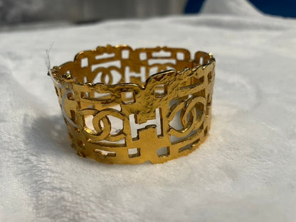 Chanel Gold Metal Cutout Cuff Bracelet