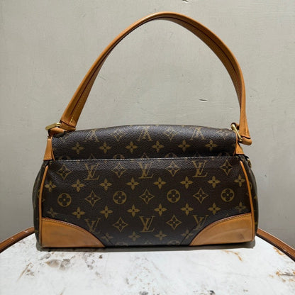 Louis Vuitton Monogram Canvas Sarria Shoulder Bag in Brown Leather