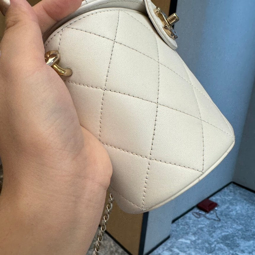 Chanel  Beige Diamond Quilted Leather Top Handle Bag