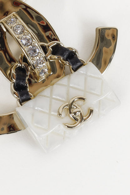 Chanel 2023 Cruise CC Bag Charm Champagne Gold Brooch