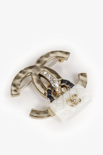 Chanel 2023 Cruise CC Bag Charm Champagne Gold Brooch