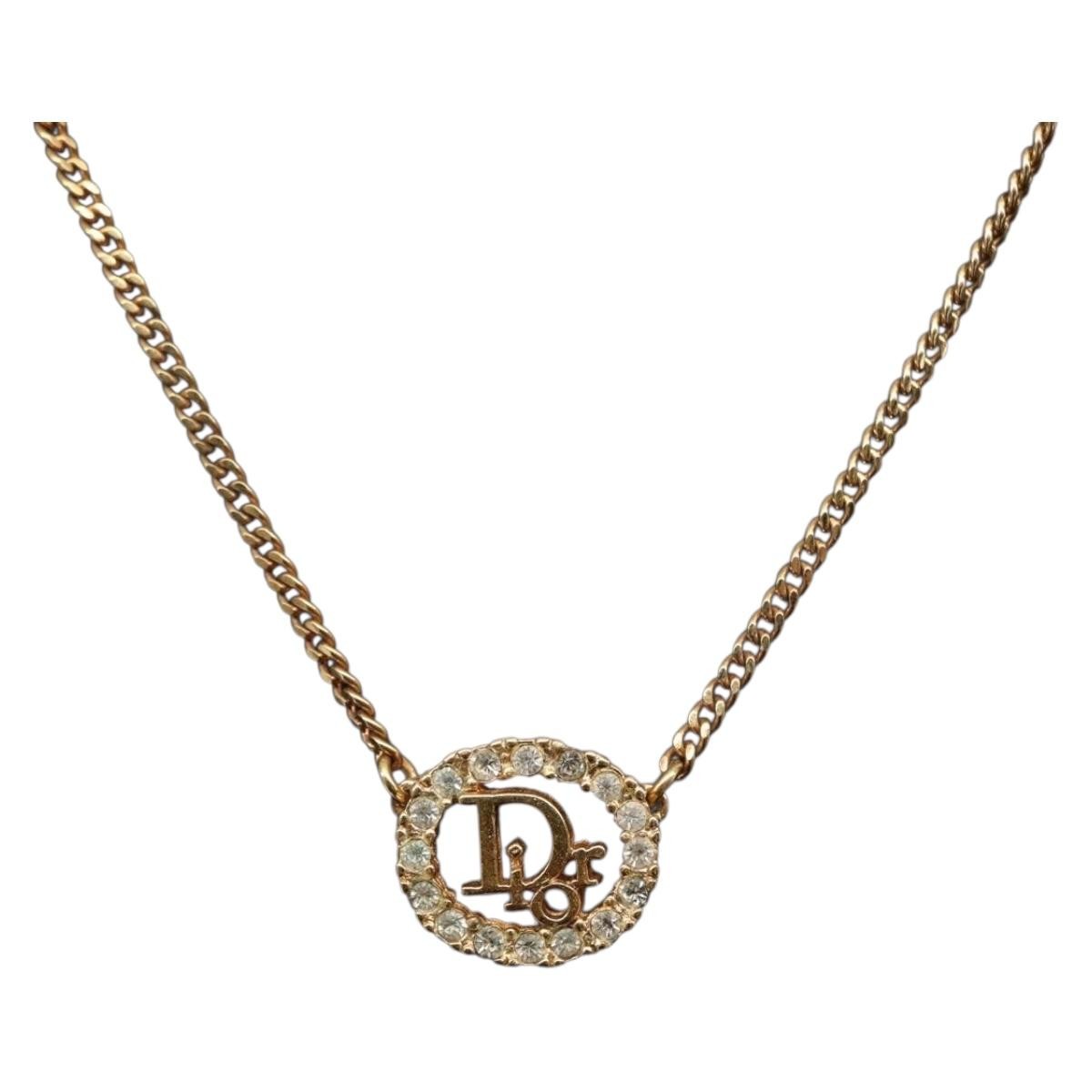 Christian Dior Vintage Logo Round Pendant Necklace Metal And Crystals Gold Metal Necklace Jewelry ()