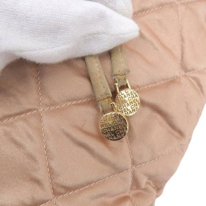 Chanel Quilted Satin Drawstring Backpack Canvas Backpack in Good condition