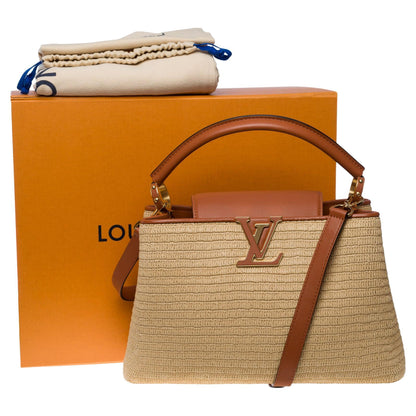 LOUIS VUITTON Limited Edition Capucines MM handbag strap in braided Raffia, GHW